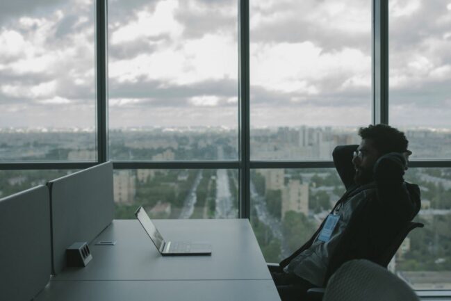 Man sat at desk in an office