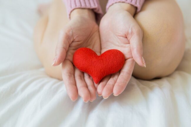 Woman holding a heart