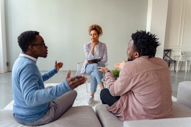 Couple arguing at counselling