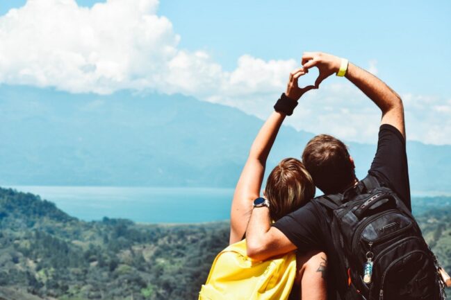 Couple-making-a-love-heart-with-their-hand